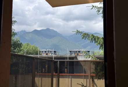 One-bedroom apartment with a balcony and beautiful mountain views